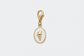 Charm Mini Coquillage blanc et doré en acier inoxydable