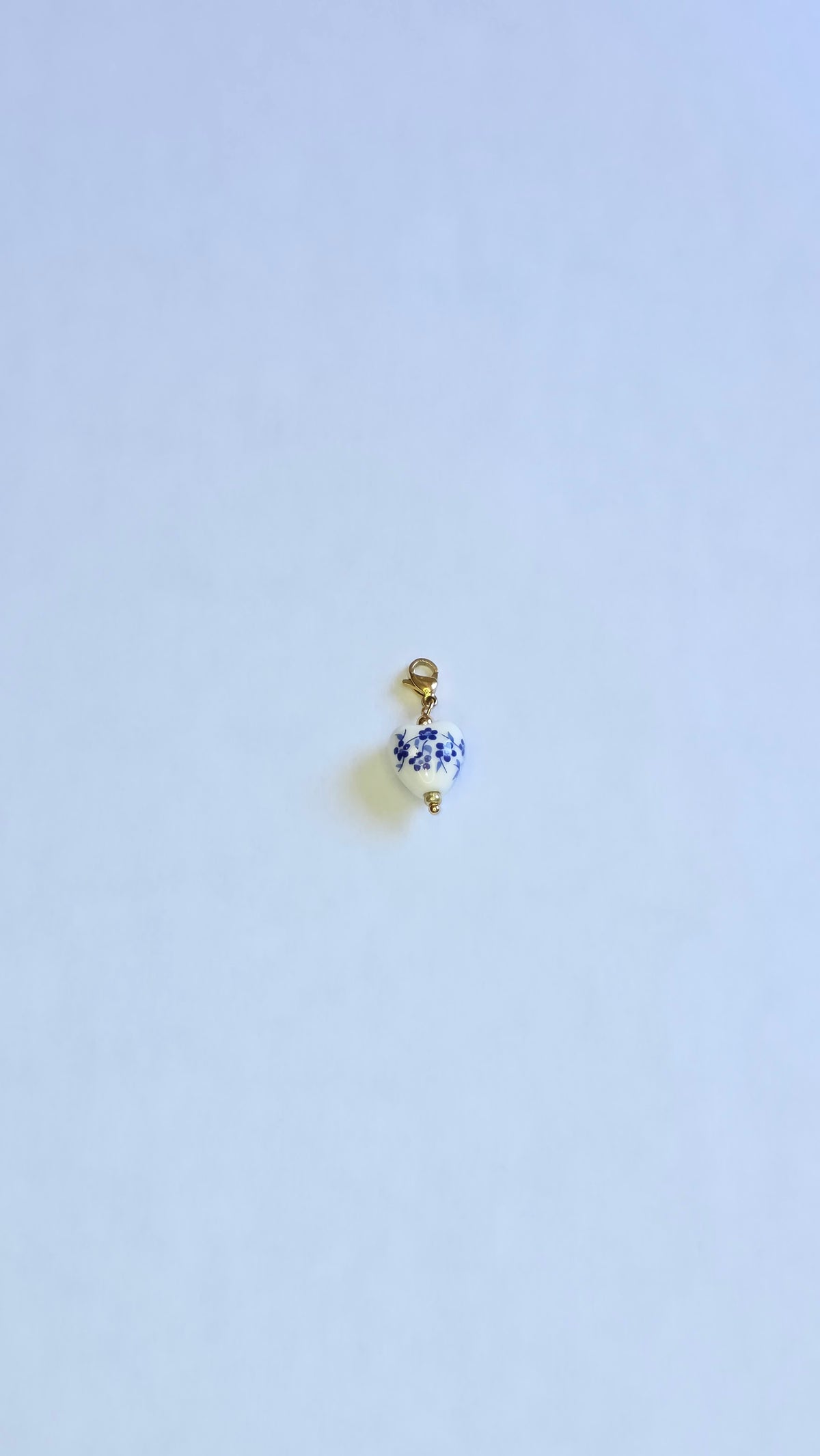 Charm Cœur de Viana doré, blanc et bleu en acier inoxydable
